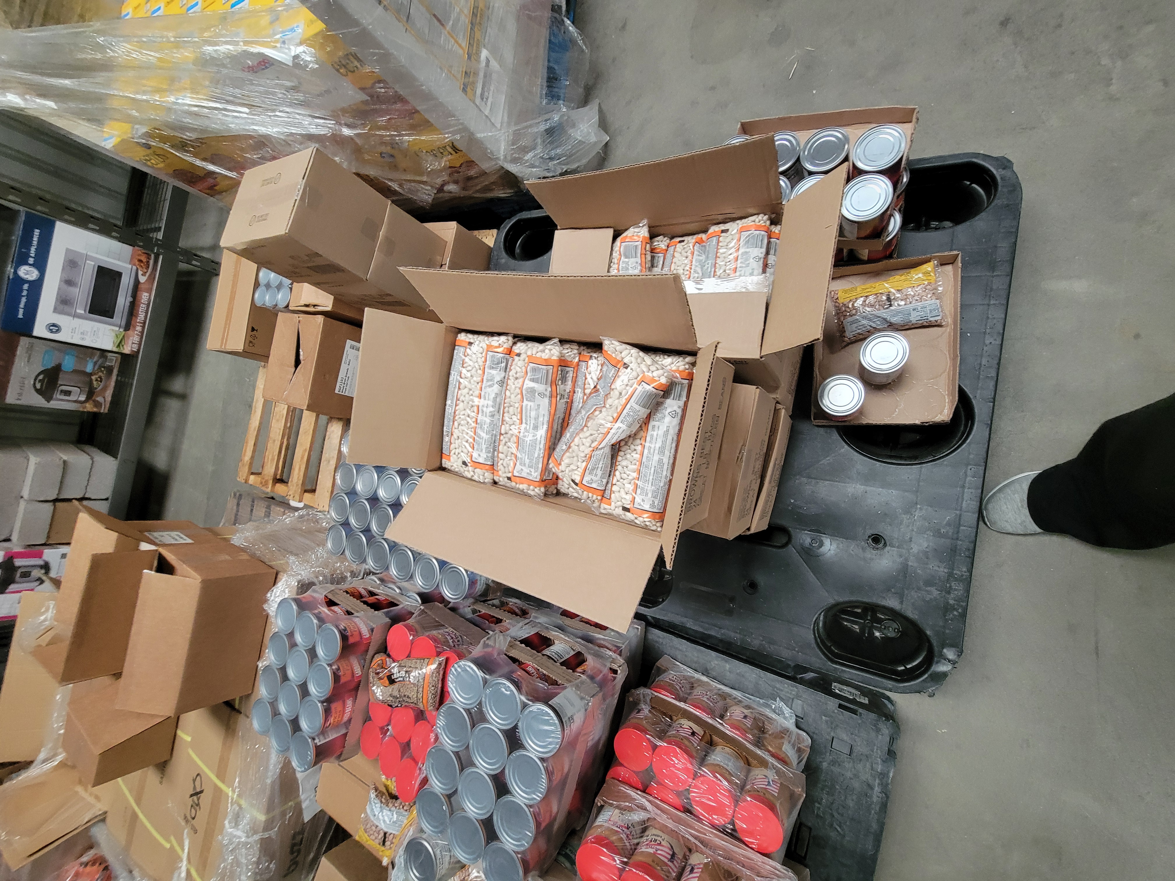 Various boxes of food on pallets.